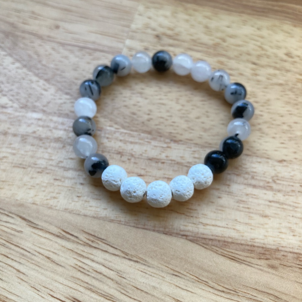 Lava rock diffuser bracelet with natural rutilated quartz stone beads